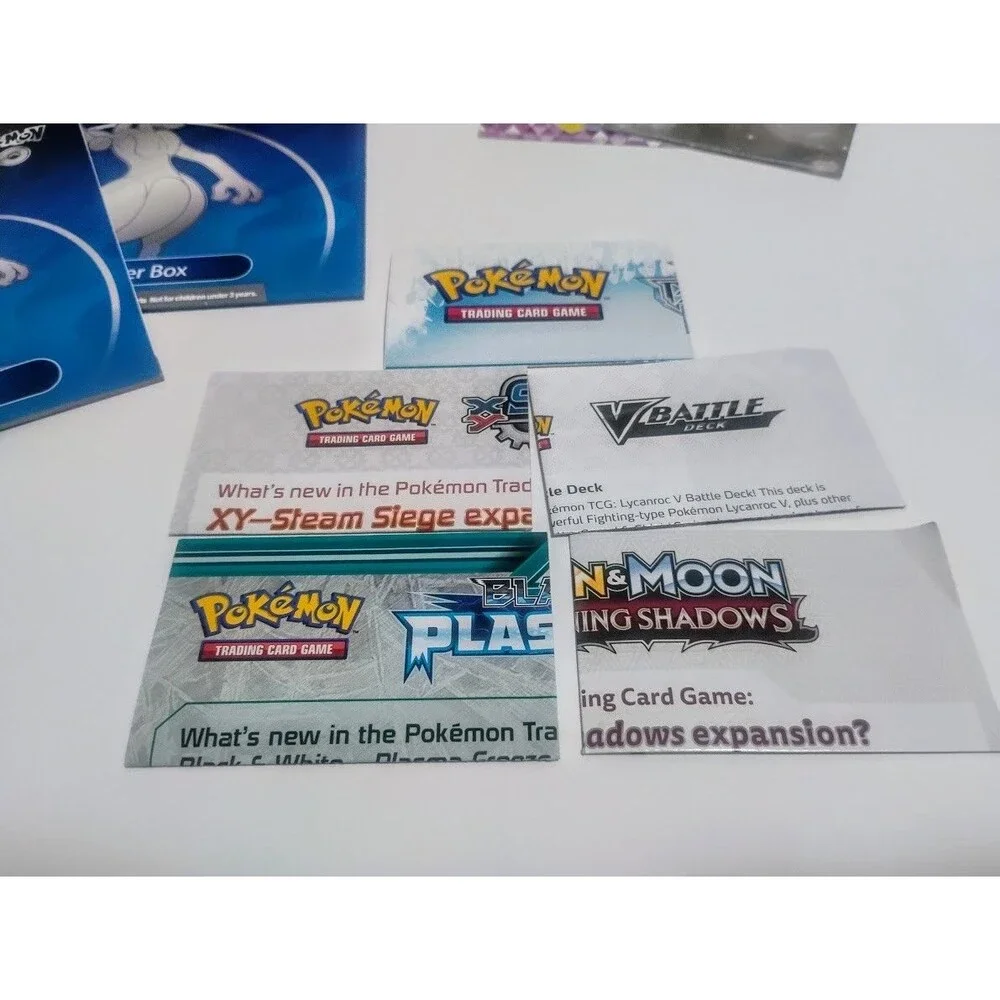 MASSIVE GAME FREAK POKEMON TCG CARD LIST RULEBOOK & PLAYMAT LOT W MORE